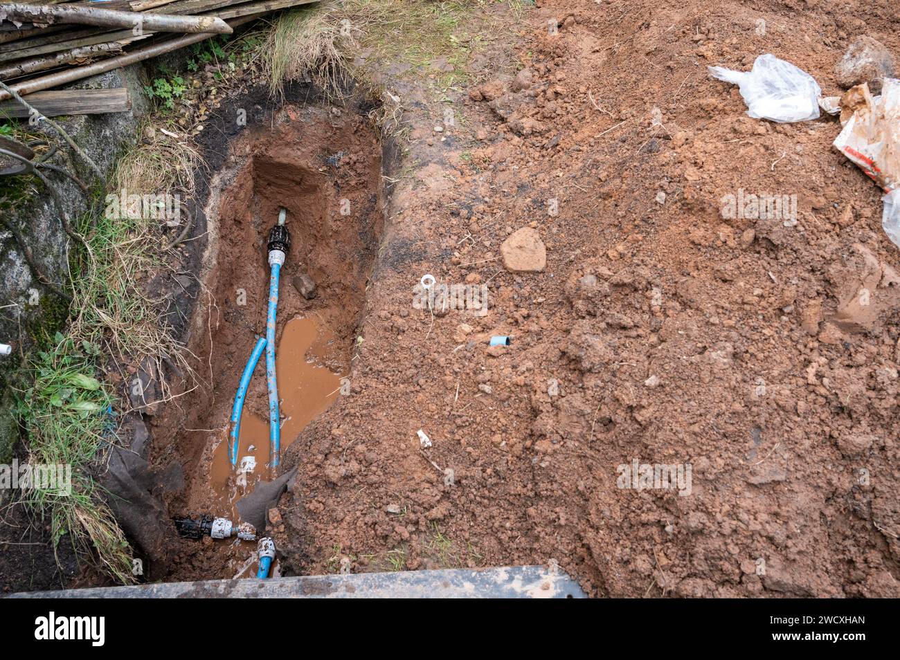 Repair to leaking branch pipe from mains water pipe by Welsh Water