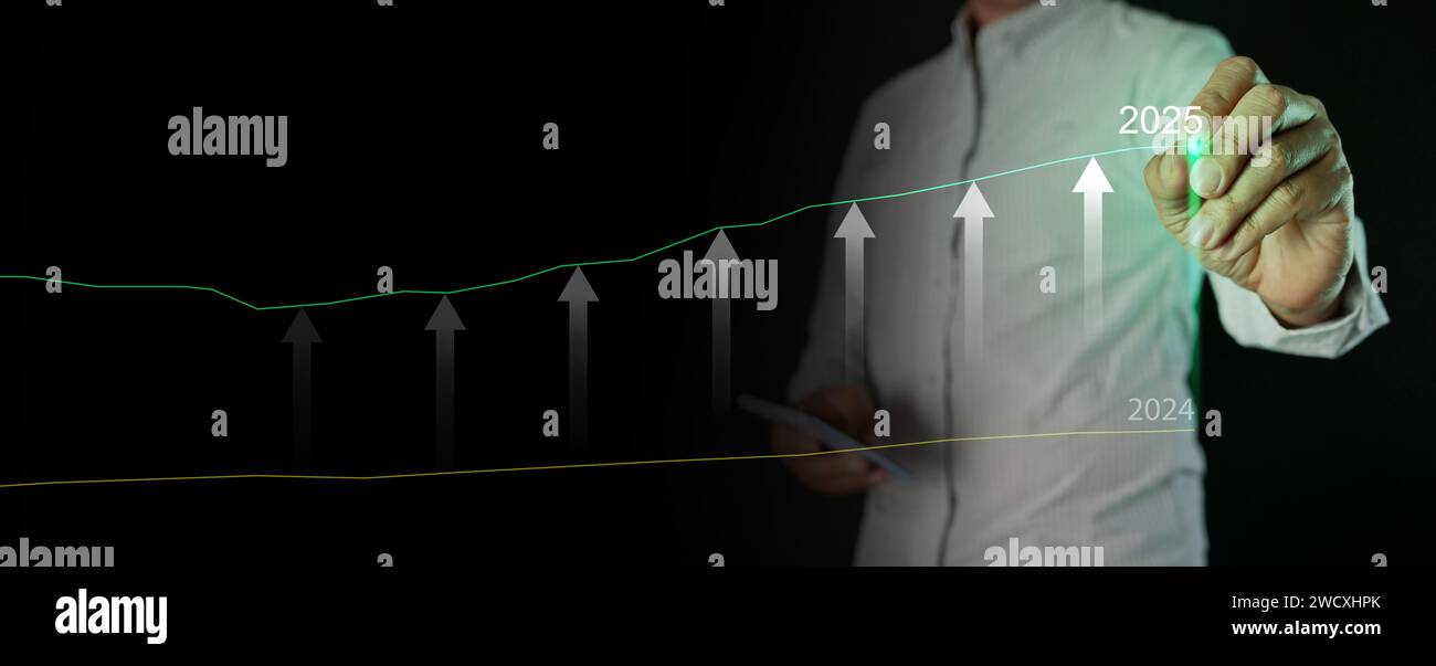 Happy new year 2025. A man with a stylus elevates or shifts the green