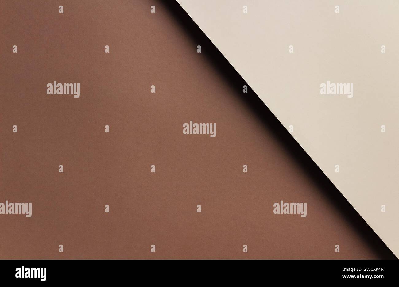 Abstract geometric background from brown and beige paper with copy space. Stock Photo