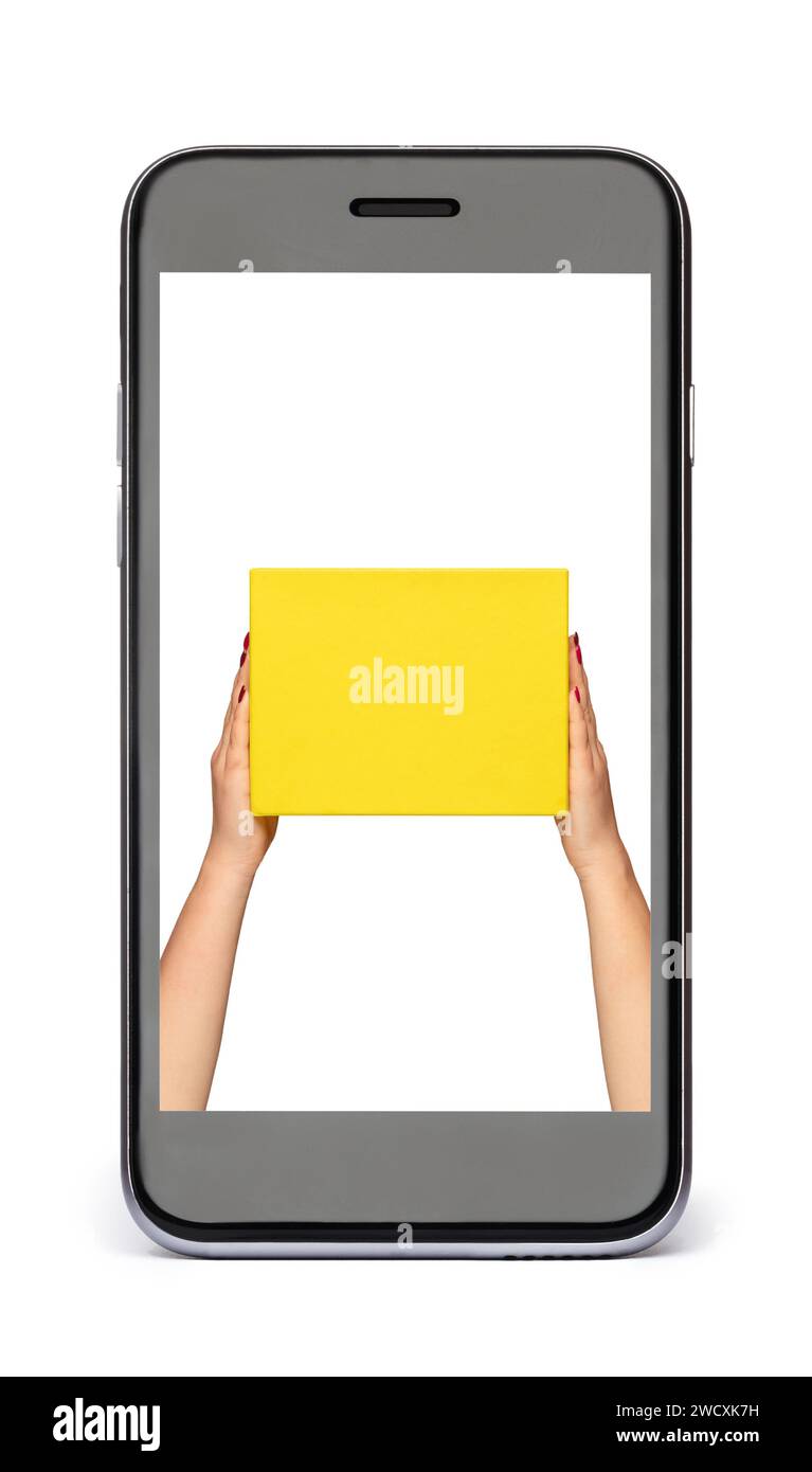 Black phone with a white screen and hands holding a yellow box. Online Shopping Concept. Isolated on white. Stock Photo