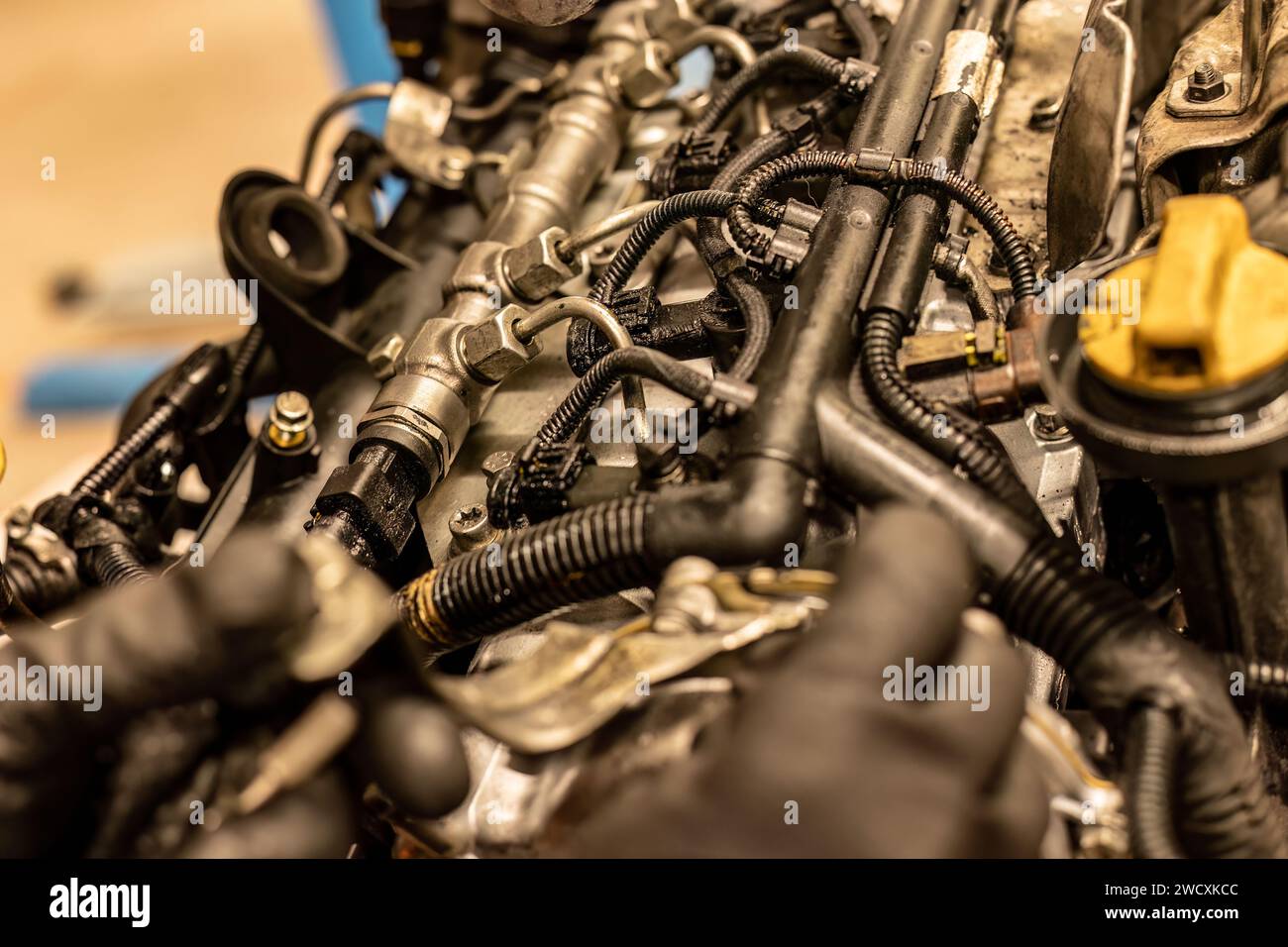 Close-up photo of common rail diesel injectors, highlighting the ...