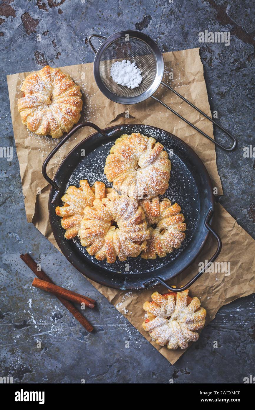 Homemade puff pastry apple rings, small healthy snack Stock Photo
