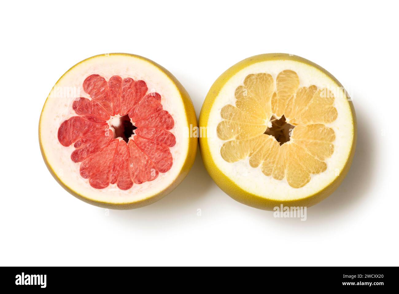 Fresh red and white flesh honey Pomelo close up isoloated on white