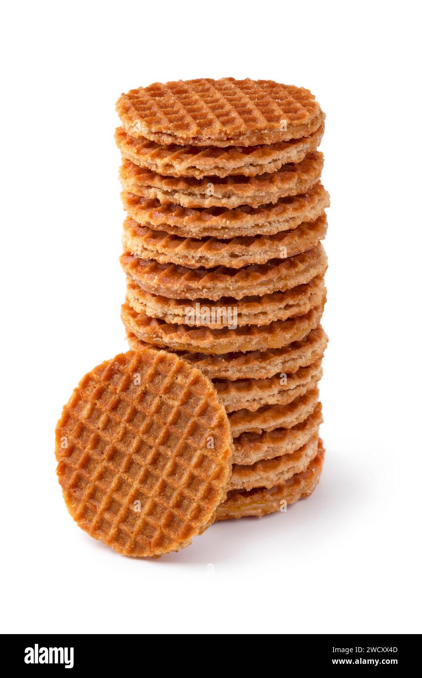 Stack of fresh baked mini stroopwafels, syrup waffles, isolated on white background close up Stock Photo