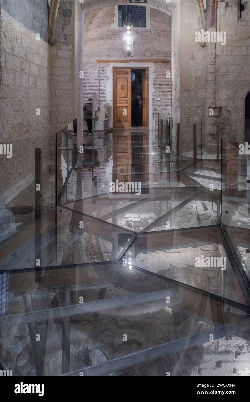 Gothic cloister with glass on the floor to see the foundations of the main mosque in the 14th century cathedral museum in the city of Murcia, Spain. Stock Photo