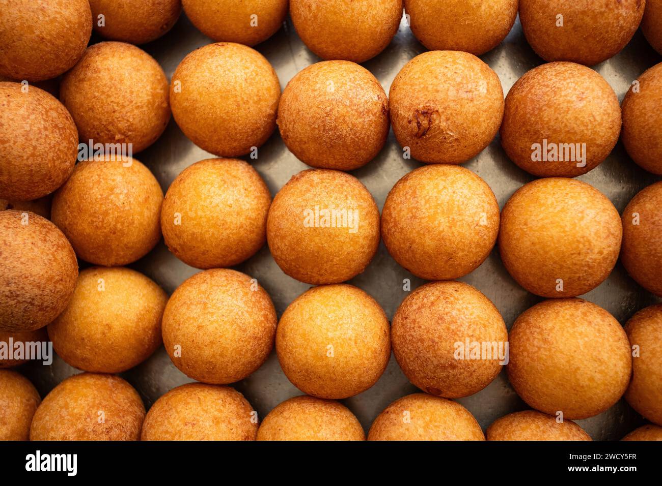 Fried buñuelos with cheese - Traditional Colombian Bakery Stock Photo