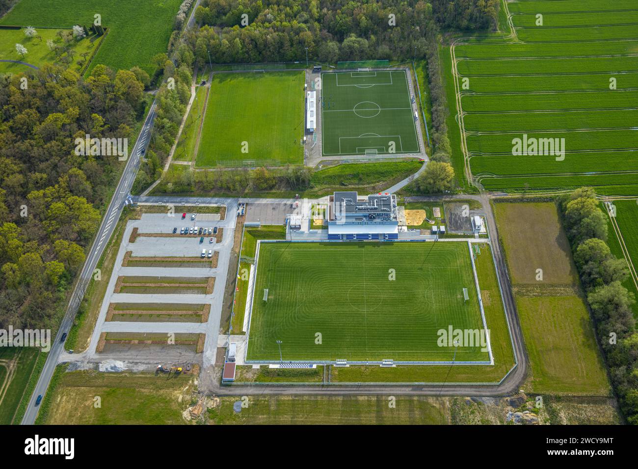 Aerial view, new sports field with stands and club building with sports daycare center, An der Lohschule, Rhynern, Hamm, Ruhr area, North Rhine-Westph Stock Photo