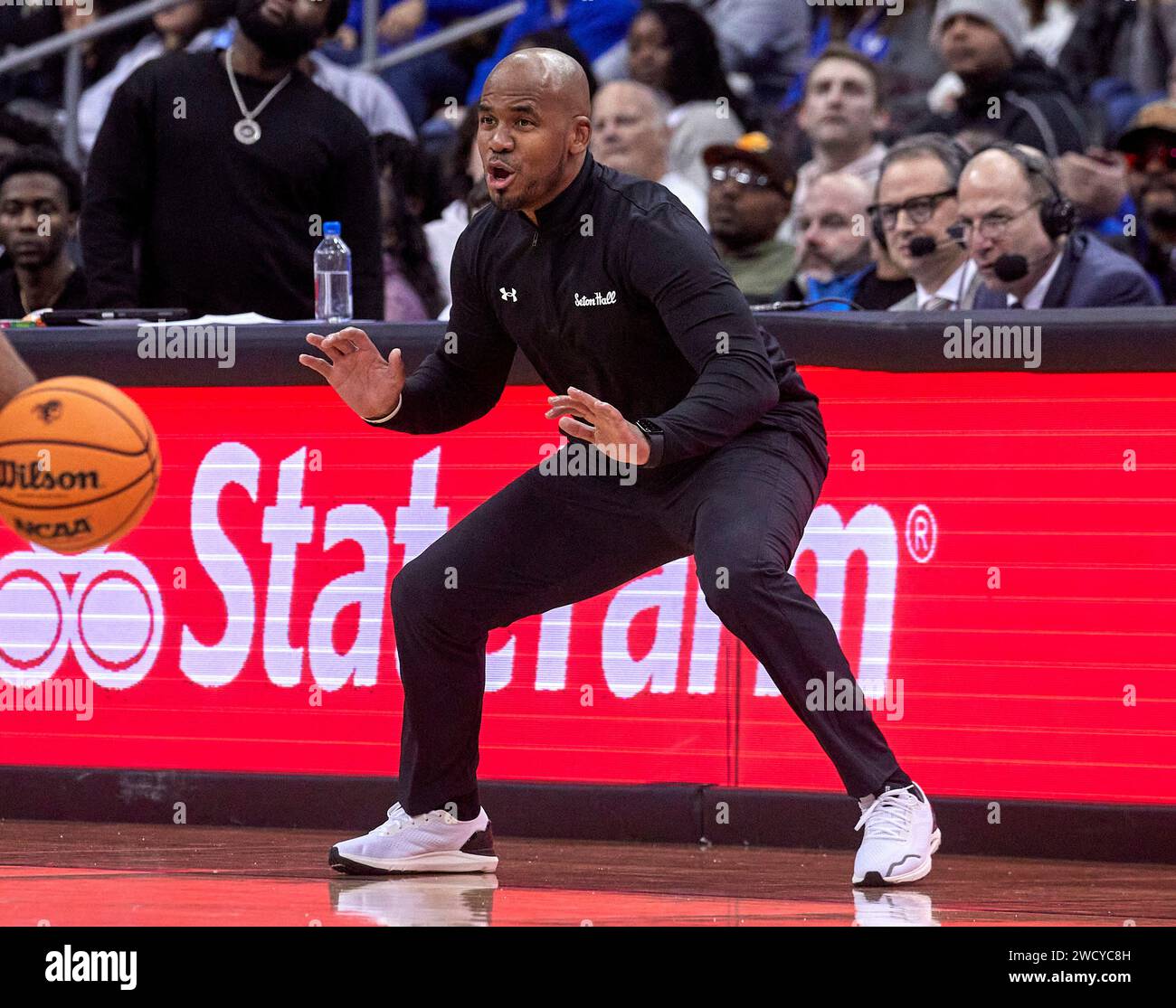 Seton HallÕs head coach Shaheen Holloway reacts to action on the court