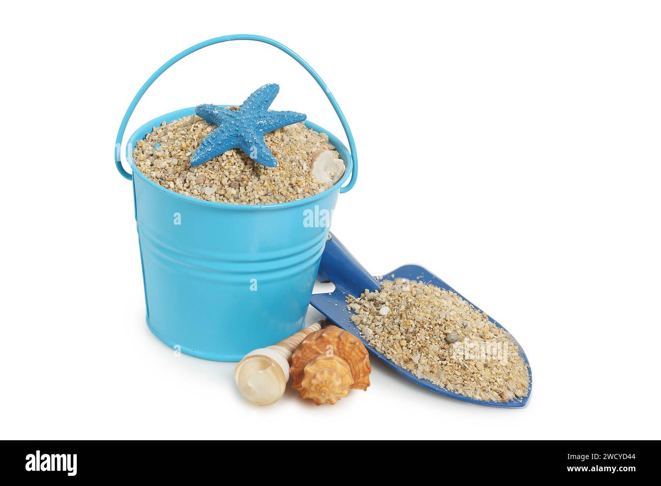 bucket, spade and seashells with sand, summer concept Stock Photo Alamy