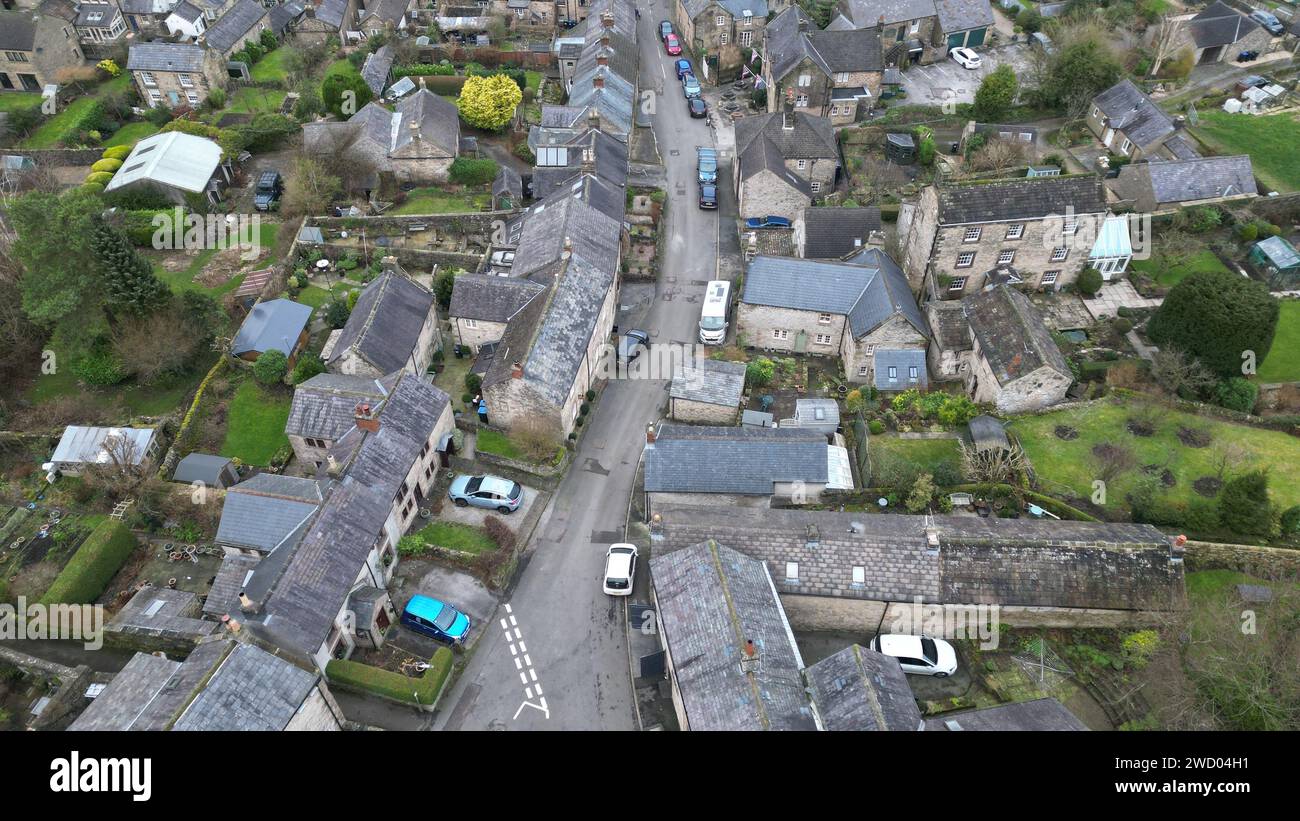 Aerial view of a suburban neighborhood with cars, houses, and green ...