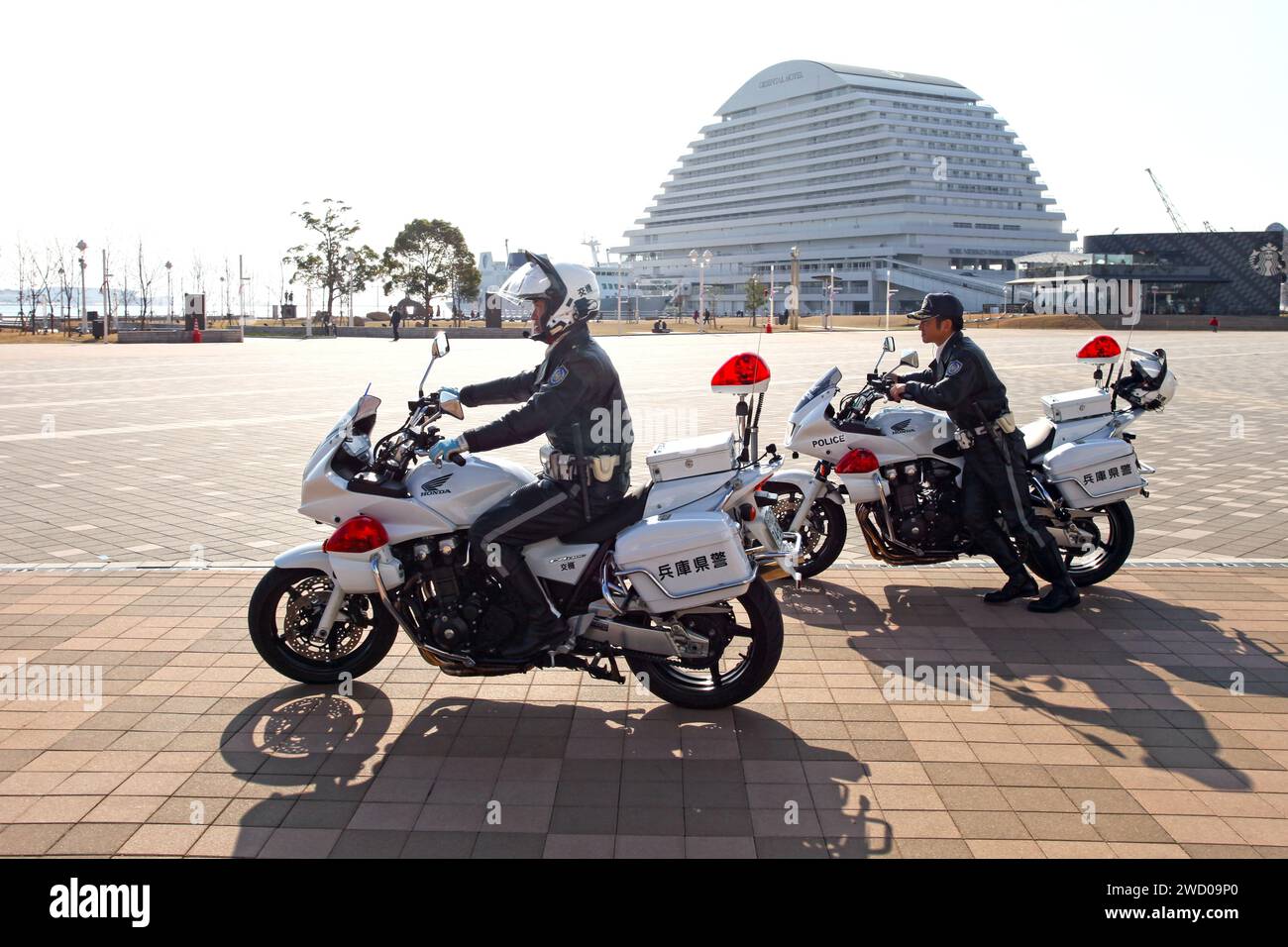 Two motorcycle police officers in Meriken Park, Kobe, Hoyogo Prefecture, Japan with Stock Photo