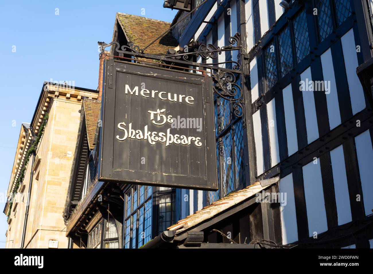 Hanging sign for the Mercure Stratford Upon Avon Shakespeare hotel, currently closed for business and undergoing an extensive refurbishment, Jan 2024 Stock Photo
