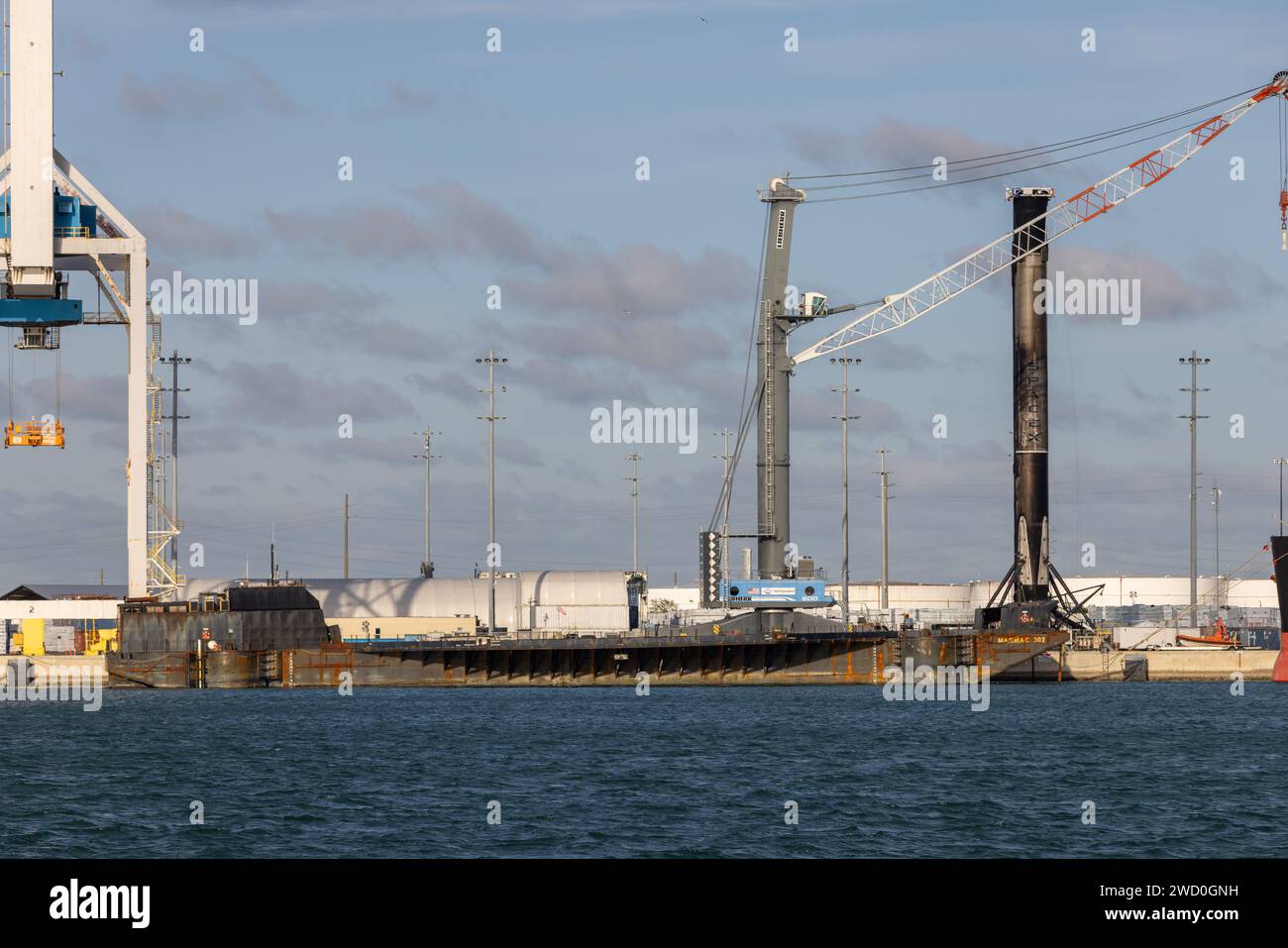 Port Canaveral, USA. 17th Jan, 2024. January 17th 2024 SpaceX Droneship ASOG & Falcon 9 B-1073-12 to Port Canaveral after the Starlink 6-37 mission on January 14th 2024 completed twelve flights to space. SpaceX has 300 successful launches now. After twelve flights to space Falcon 9 first stage booster B-1073 is off loaded from SpaceX droneship ASOG A Shortfall Of Gravitas at Port Canaveral Florida Brevard County USA. (Photo by Scott Schilke/Sipa USA) Credit: Sipa USA/Alamy Live News Stock Photo