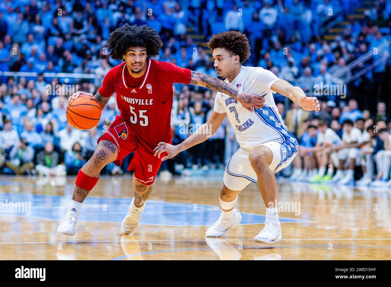 Chapel Hill, NC, USA. 17th Jan, 2024. Louisville Cardinals guard Skyy Clark (55) drives by North