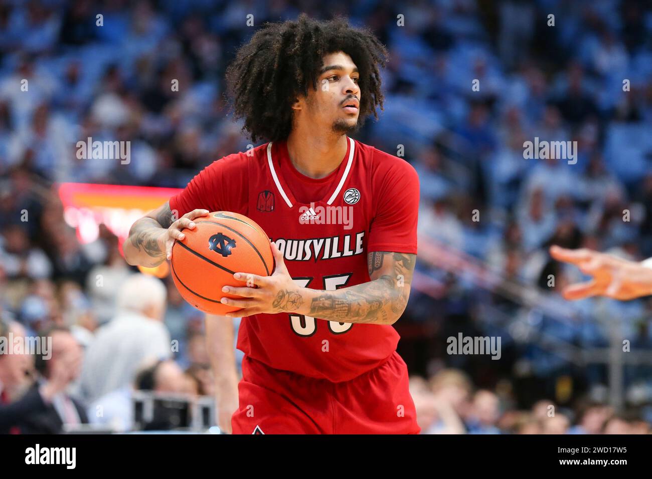 CHAPEL HILL, NC JANUARY 17 Louisville Cardinals guard Skyy Clark (55) looks to pass during