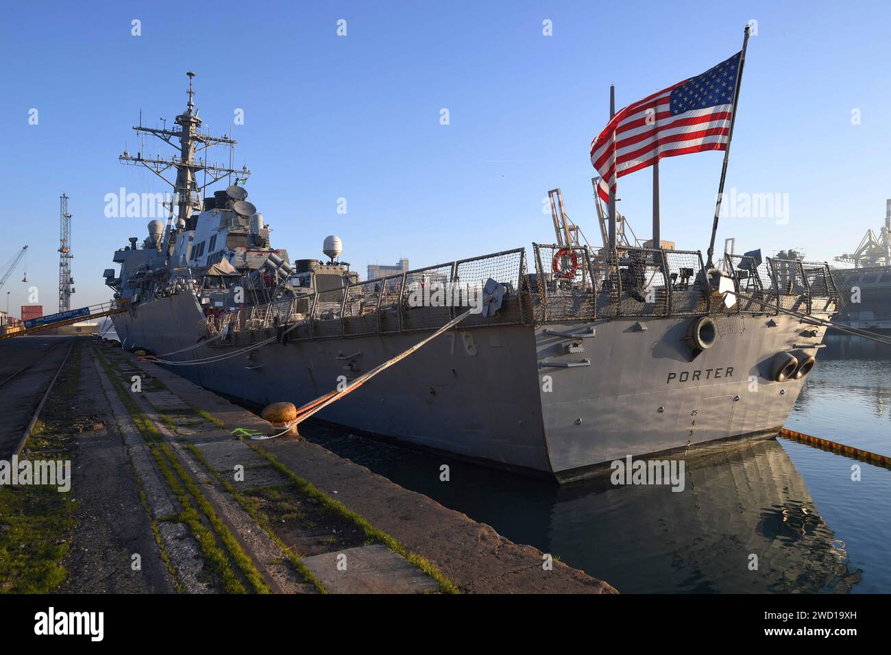 The guided missile destroyer USS Porter sits pierside in Venice, Italy. Stock Photo