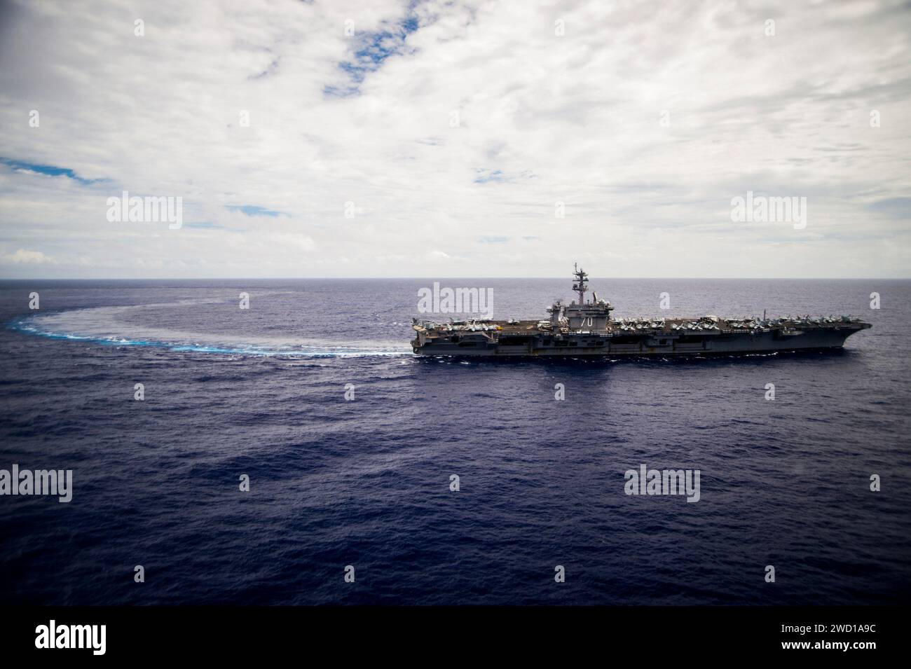 The aircraft carrier USS Carl Vinson transits the Pacific Ocean. Stock Photo
