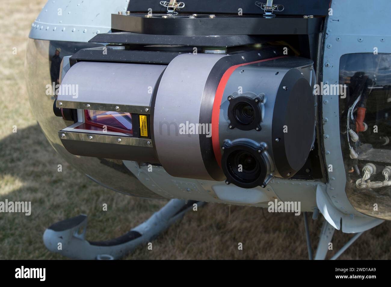 A UH-1 Huey equipped with an Autonomous Aerial Cargo/Utility System. Stock Photo