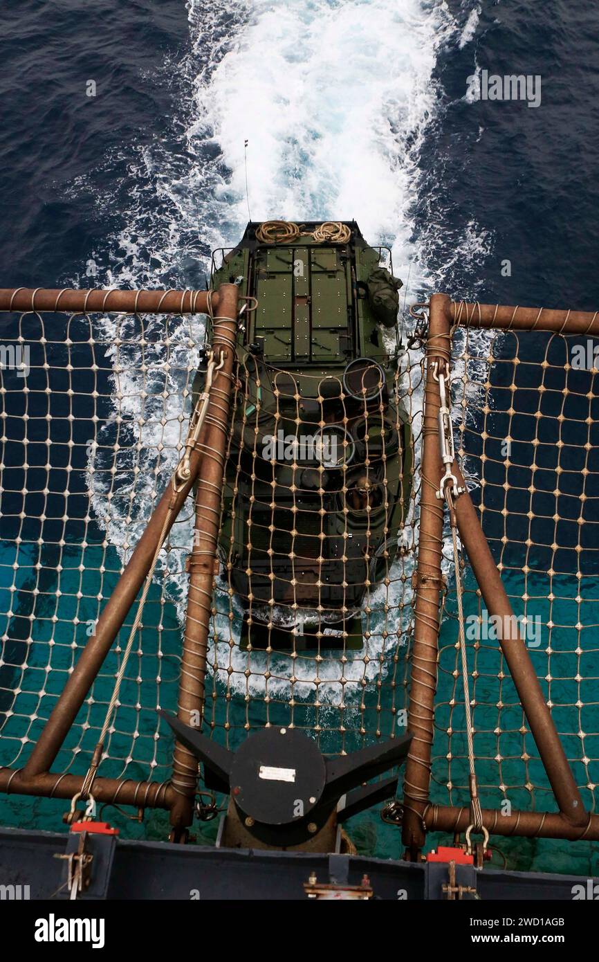 An AAV-P7/A1 assault amphibious vehicle enters the well deck of USS Ashland. Stock Photo