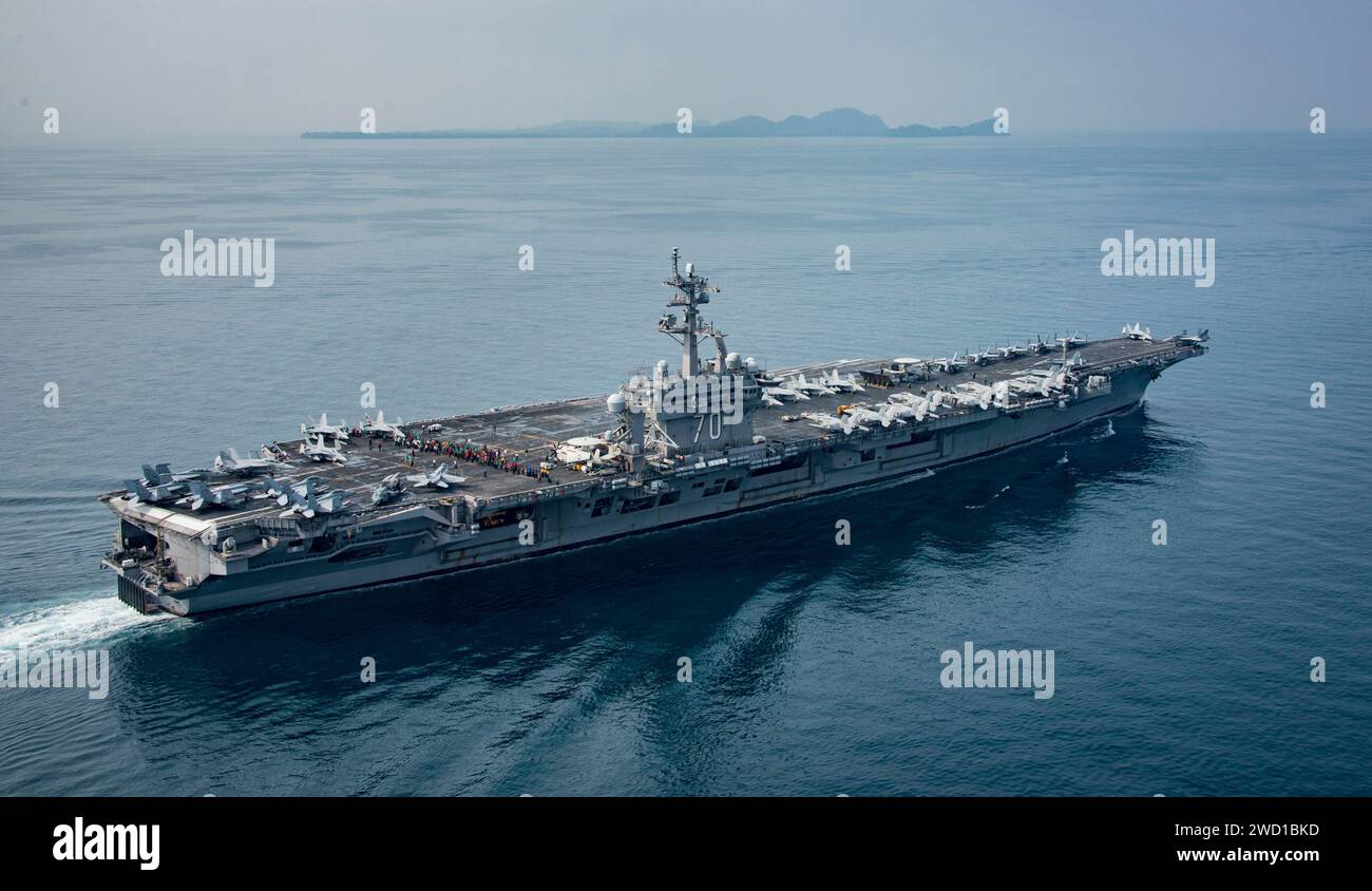 The aircraft carrier USS Carl Vinson (CVN 70) transits the Sunda Strait. Stock Photo