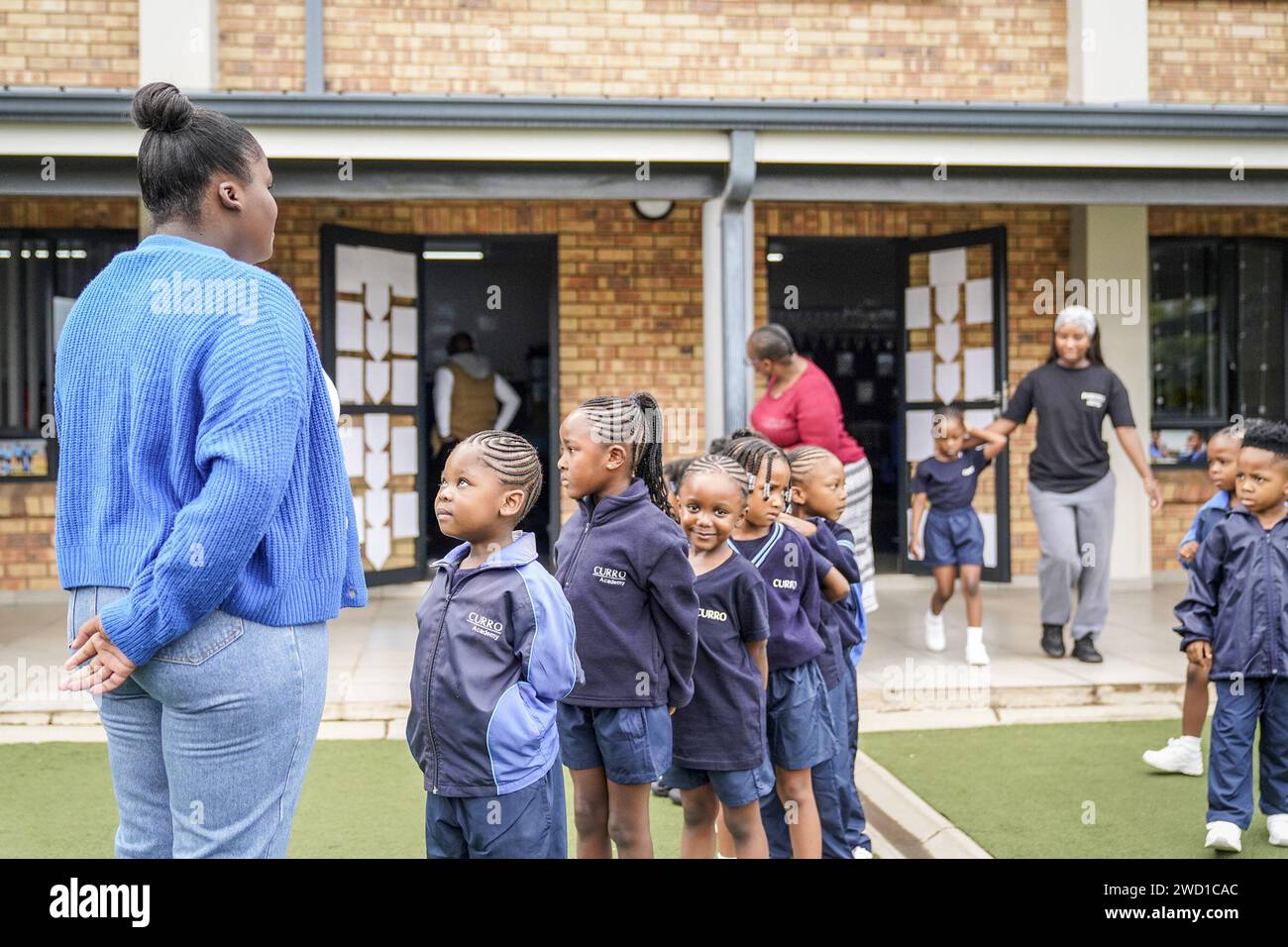 Beijing, South Africa. 17th Jan, 2024. Students queue up in front of