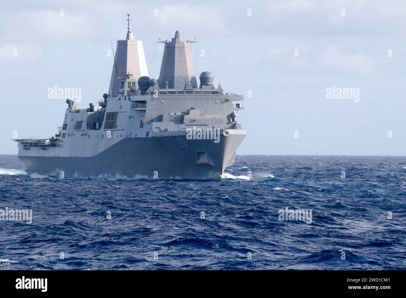 The amphibious transport dock ship USS Green Bay transits the Coral Sea. Stock Photo