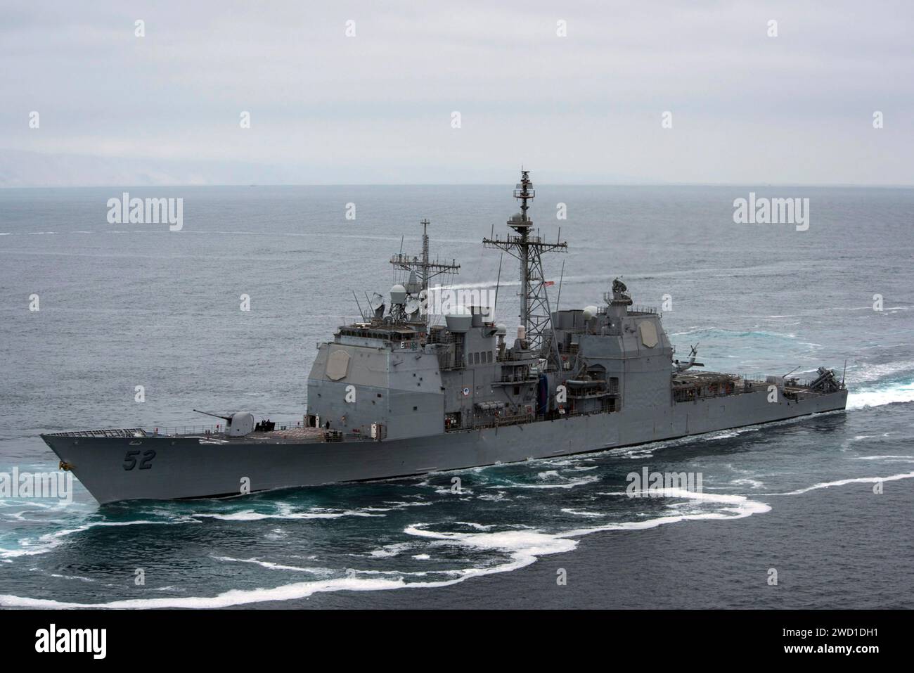 The guided-missile cruiser USS Bunker Hill transits the Pacific Ocean. Stock Photo