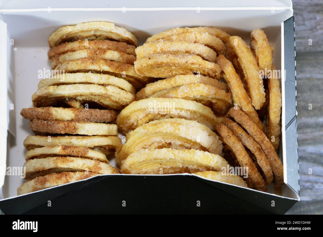 palmier, short for feuille de palmier 'palm tree leaf, French hearts