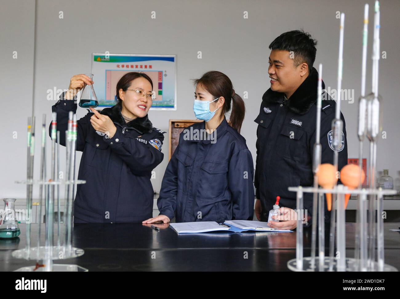 Police conduct a safety check at a precursor chemical company in Linyi city, East China's Shandong province, Jan 18, 2024. Stock Photo