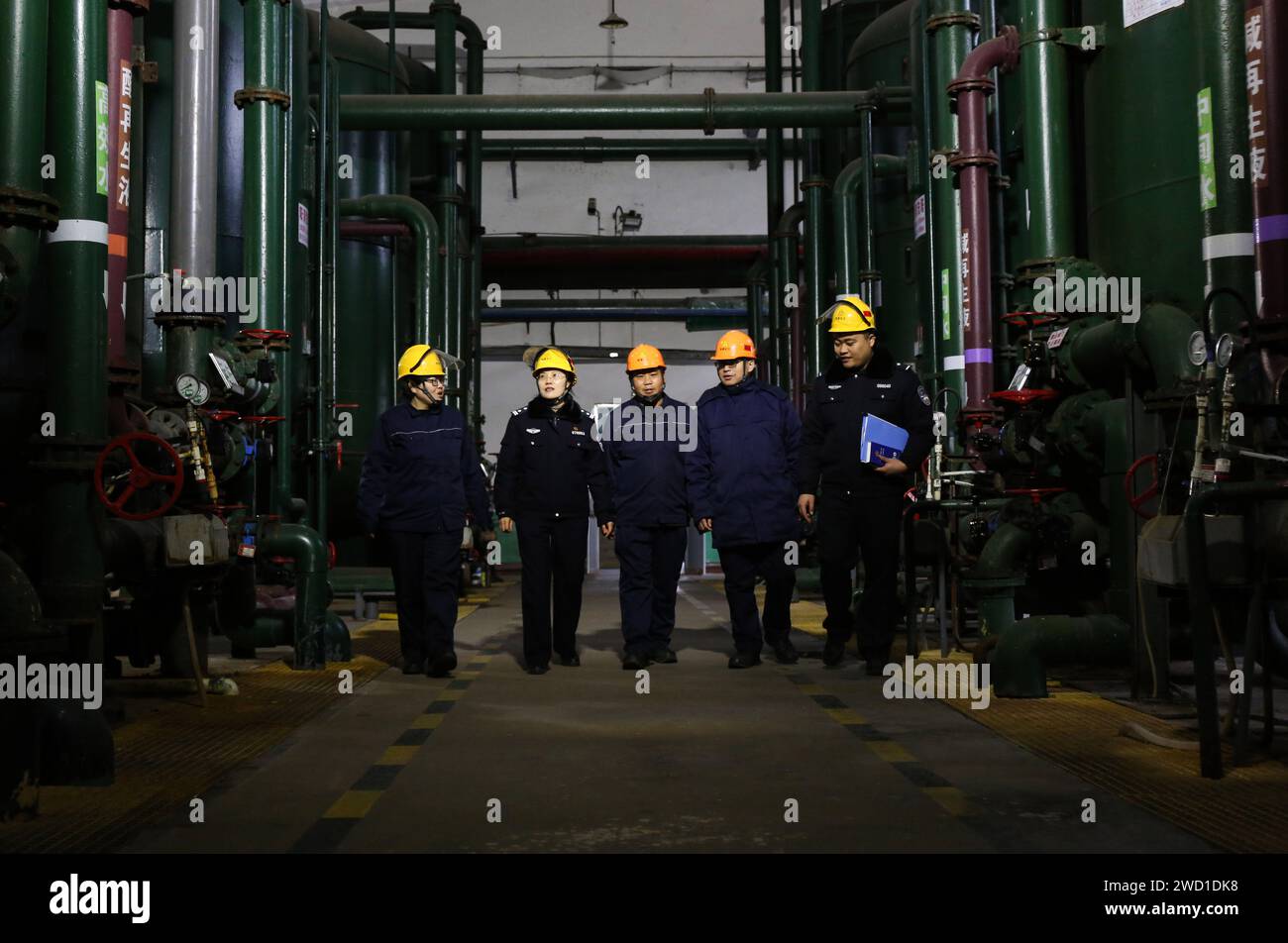 Police conduct a safety check at a precursor chemical company in Linyi city, East China's Shandong province, Jan 18, 2024. Stock Photo
