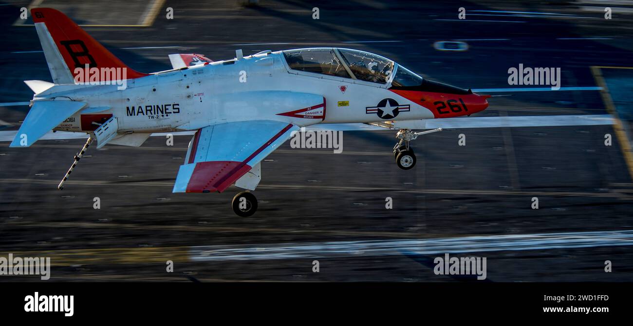 A T-45 Goshawk lands on the aircraft carrier USS George H.W. Bush Stock Photo