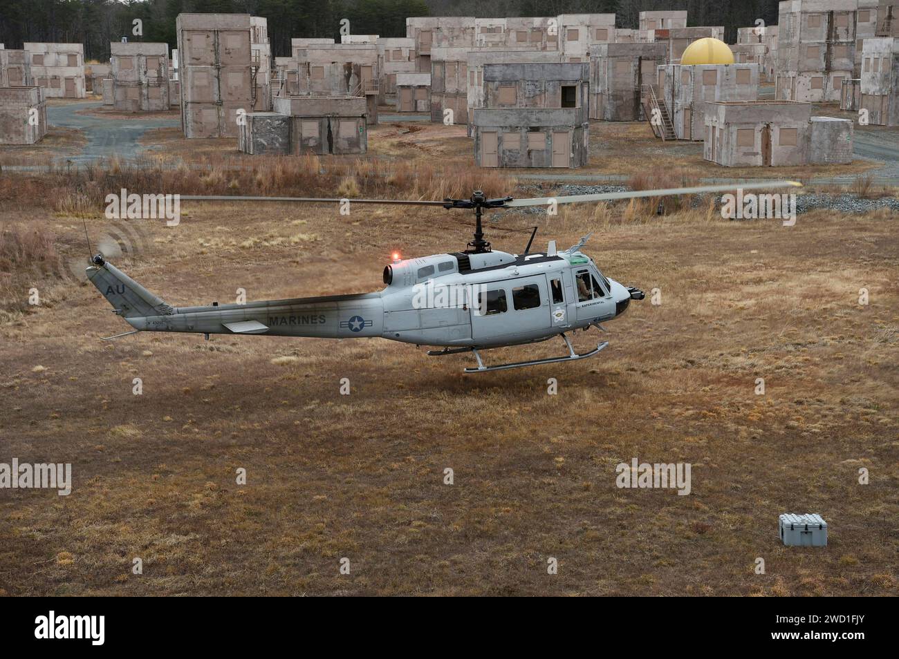 A UH-1 Huey helicopter makes an approach for landing at Marine Corps Base Quantico, Virginia. Stock Photo