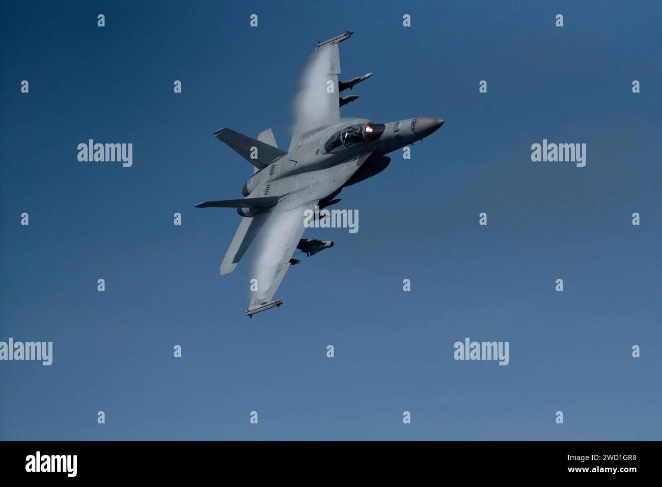 An F/A-18F Super Hornet flies at high-speed. Stock Photo