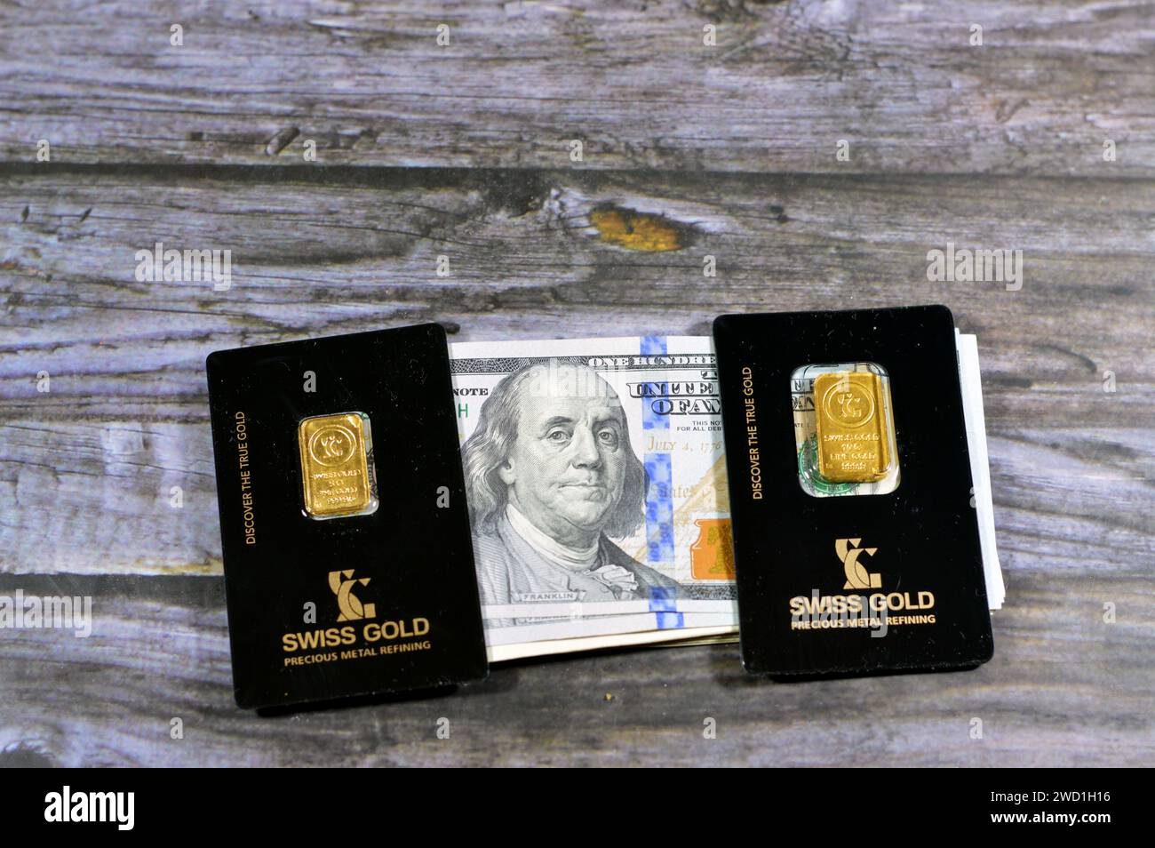 Cairo, Egypt, January 15 2024: USD American dollars and Swiss Gold 24 ...