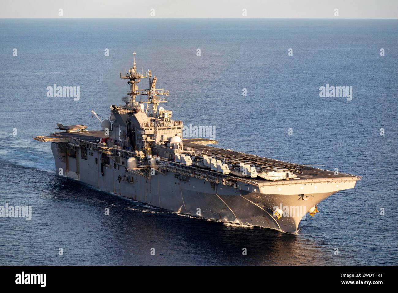 The amphibious assault ship USS Makin Island transits the Indian Ocean. Stock Photo