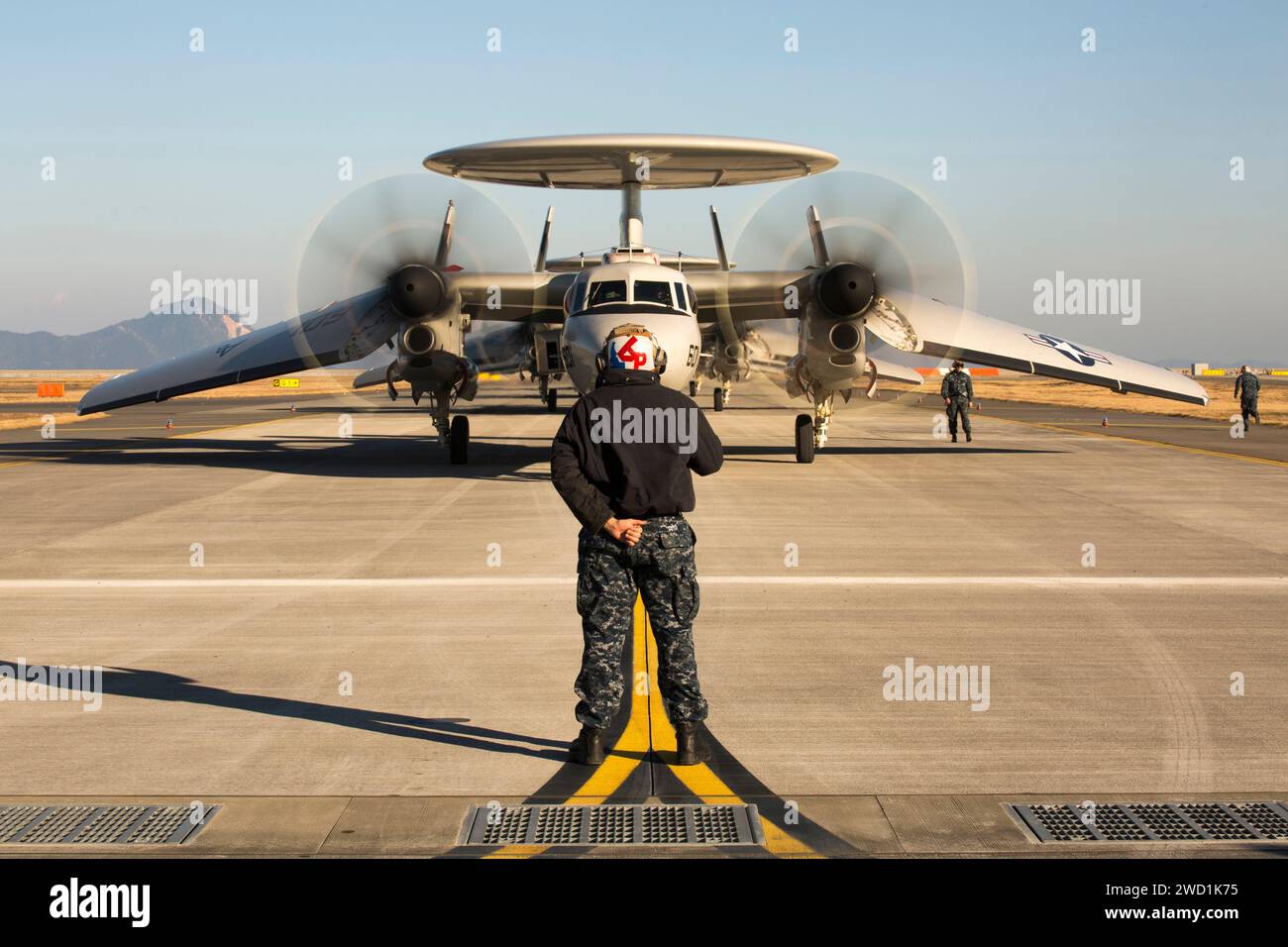 Five E-2D Advanced Hawkeyes land onboard Marine Corps Air Station Iwakuni, Japan. Stock Photo