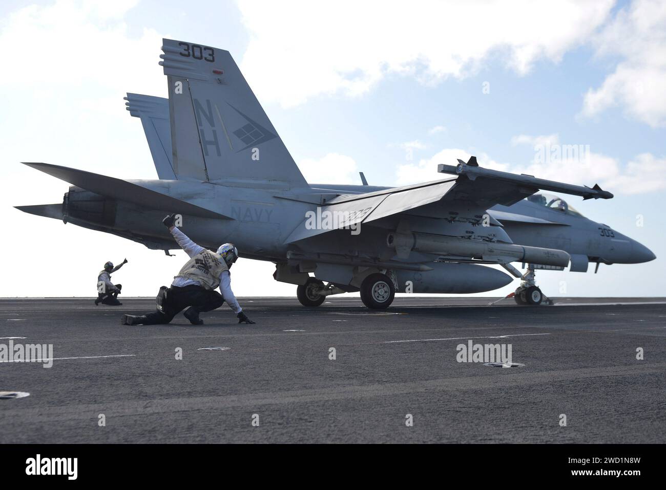 An F A 18E Super Hornet Launches Off The Flight Deck Of The Aircraft an-f-a-18e-super-hornet-launches-off-the-flight-deck-of-the-aircraft