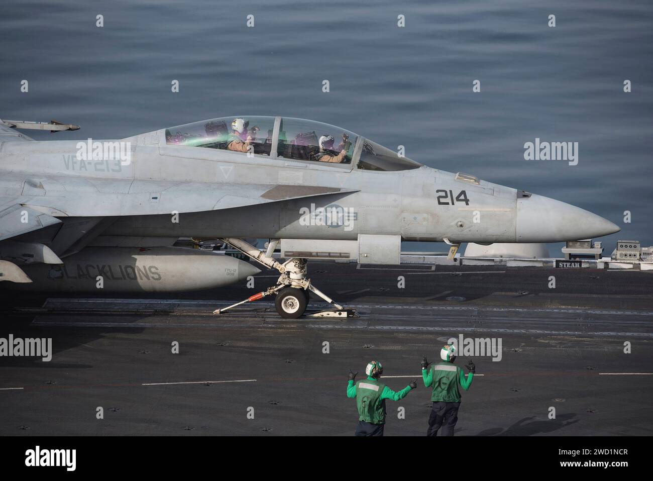 An F/A-18F Super Hornet prepares to launch from the aircraft carrier USS George H.W. Bush. Stock Photo