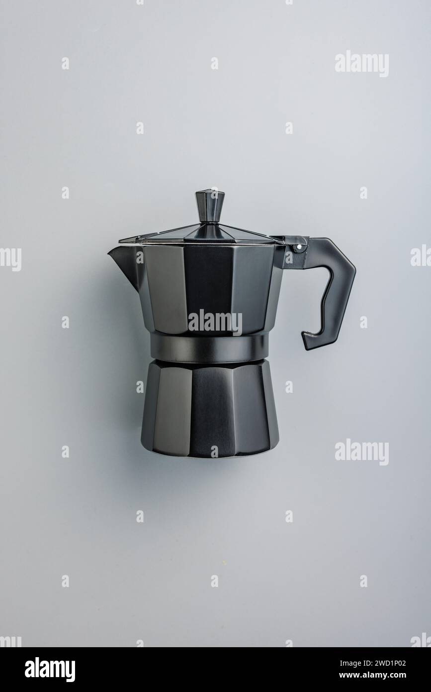 Bialetti moka pot. Coffee maker on the gray background. Top view Stock