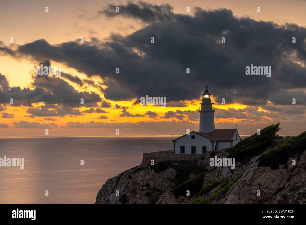 Dawn at Capdepera lighthouse near Cala Rajada, island of Mallorca, Spain Stock Photo