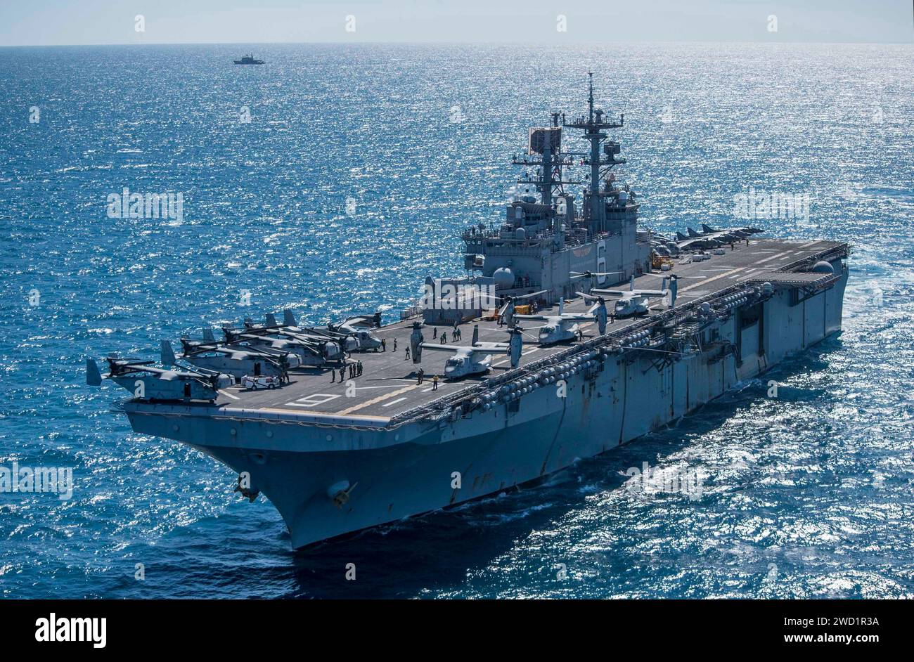 The amphibious assault ship USS Bonhomme Richard transits the Coral Sea. Stock Photo