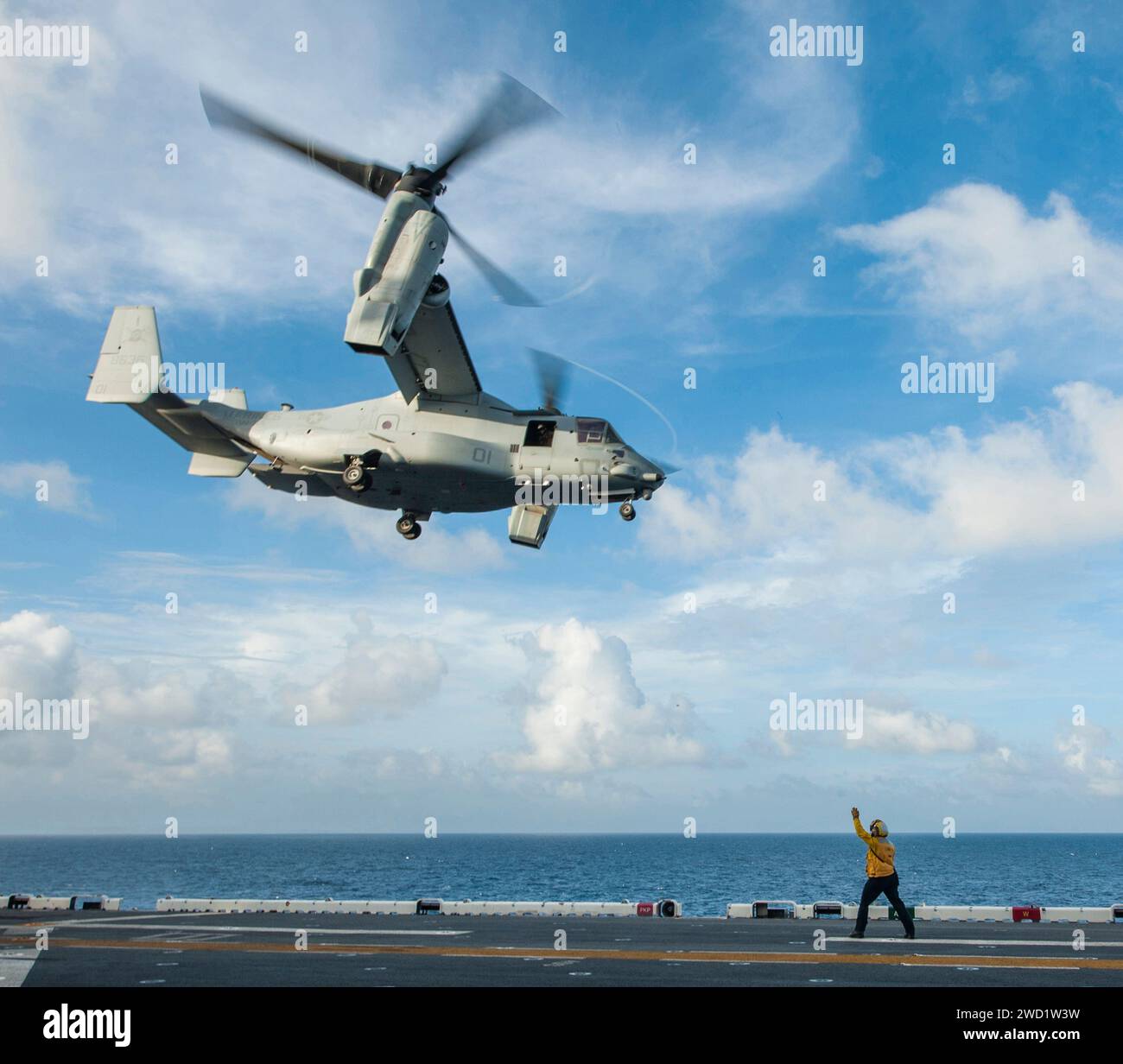 An MV-22 Osprey takes off from the flight deck of USS Wasp. Stock Photo