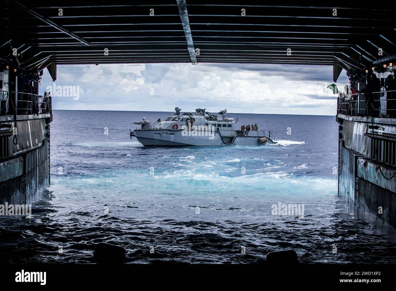 Patrol Boat Mk VI disembarks amphibious dock landing ship USS Comstock. Stock Photo