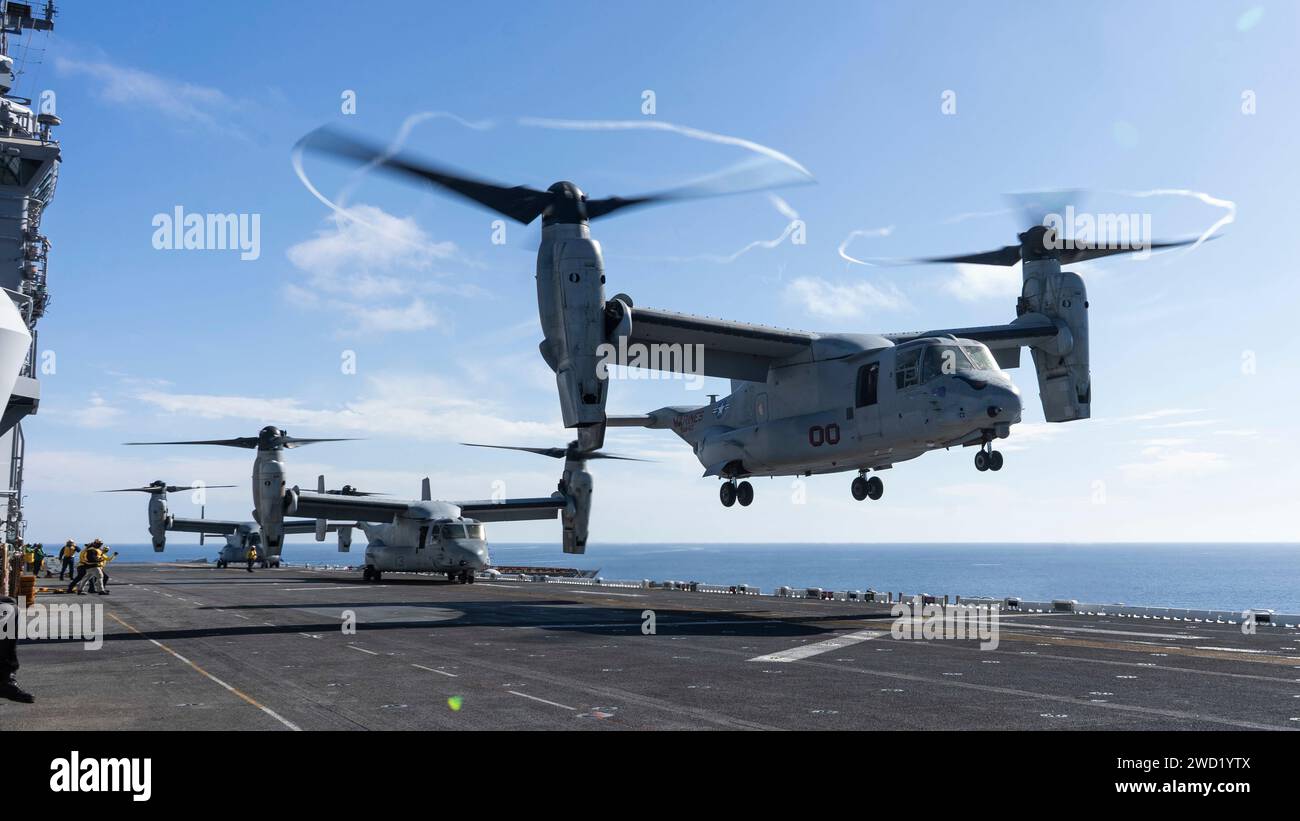 A U.S. Marine Corps MV-22B Osprey departs USS Essex off the coast of Southern California. Stock Photo