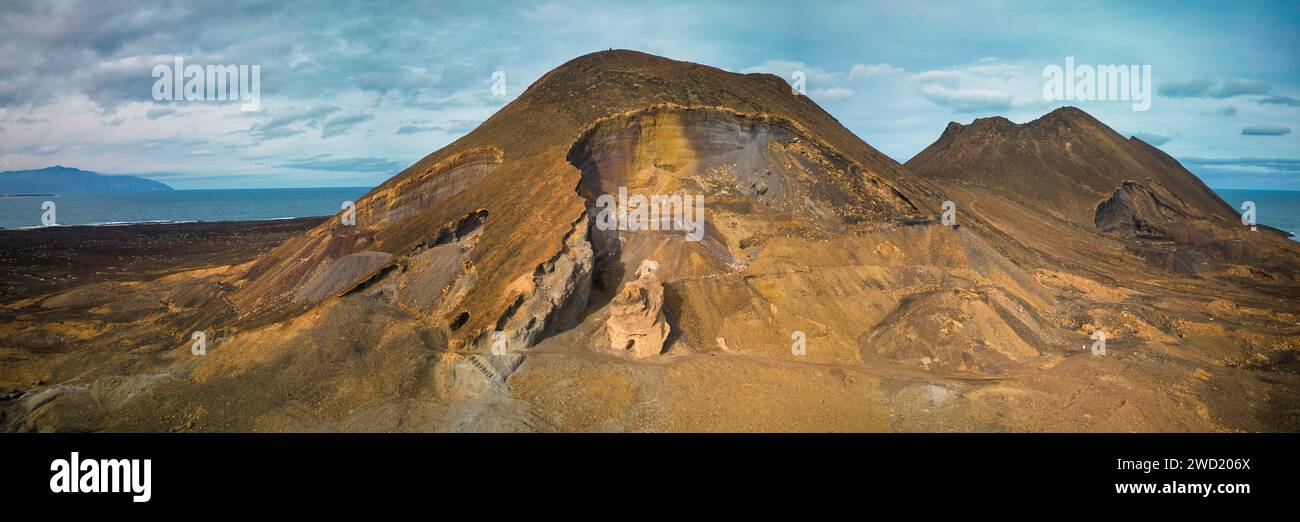 Panoramic image of the Calhau volcanoes in São Vicente, Cape Verde, highlighting the striking volcanic ridge with visible erosion patterns and geologi Stock Photo