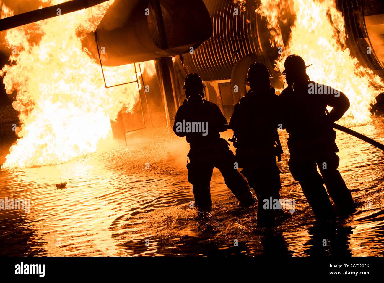 U.S. Air Force and civilian firefighters put out a blaze at Moody Air Force Base, Georgia. Stock Photo