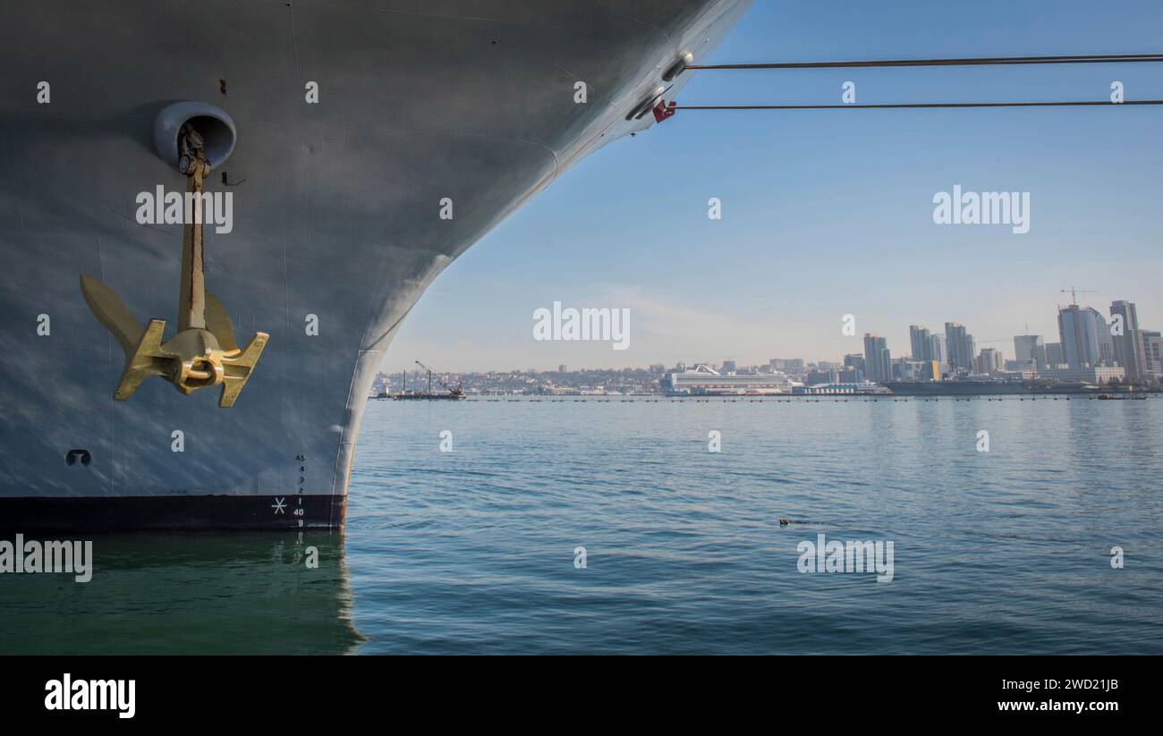 USS Theodore Roosevelt lowers the starboard side anchor into San Diego Bay, California. Stock Photo