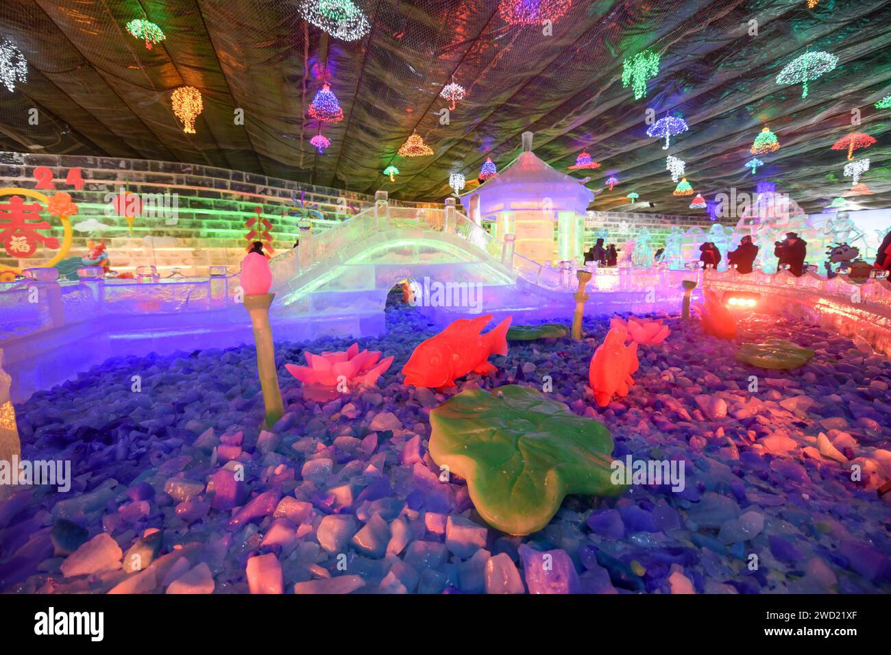 People have fun at the Longqingxia ice and snow carnival in Yanqing