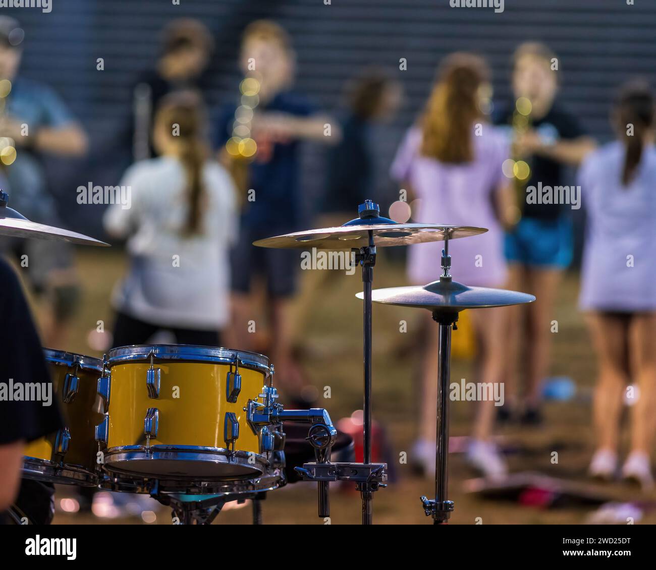 modified drum kit set up outside as part of a marching bands sideline percussion Stock Photo