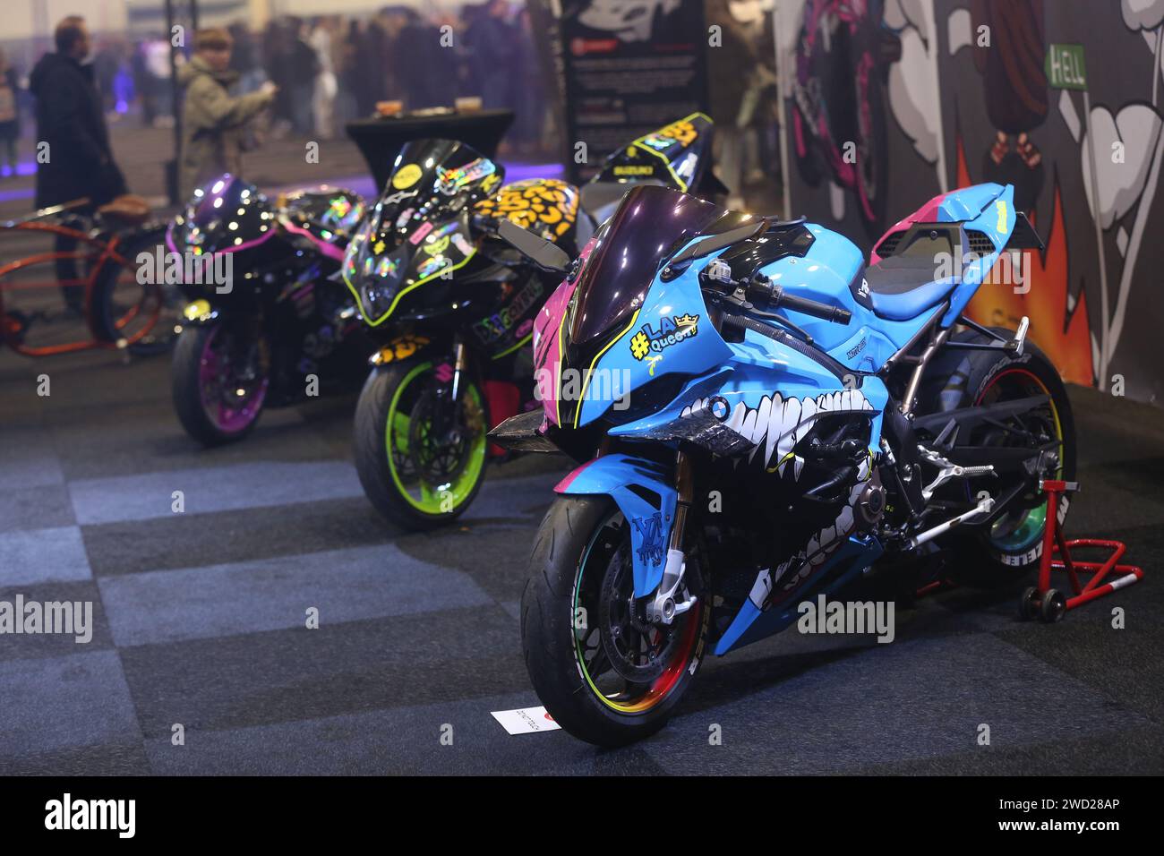 Brussels. 17th Jan, 2024. This photo taken on Jan. 17, 2024 shows motorcycles displayed at Brussels Auto Show in Brussels, Belgium. This year's Brussels Auto Show (BAS) kicked off on Wednesday in the Belgian capital, presenting over 400 cars, motorcycles, and trucks from more than 150 companies, putting sustainable mobility in the limelight. Credit: Zhao Dingzhe/Xinhua/Alamy Live News Stock Photo